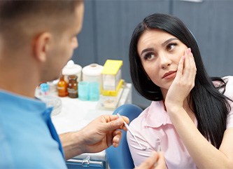 Dentist about to perform implant failure and salvage